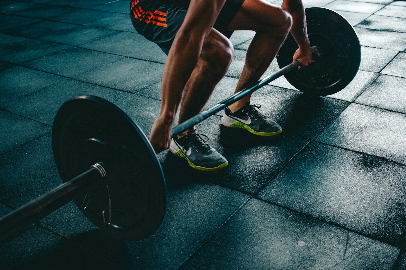 Person training in a gym; illustrative fitness imagery